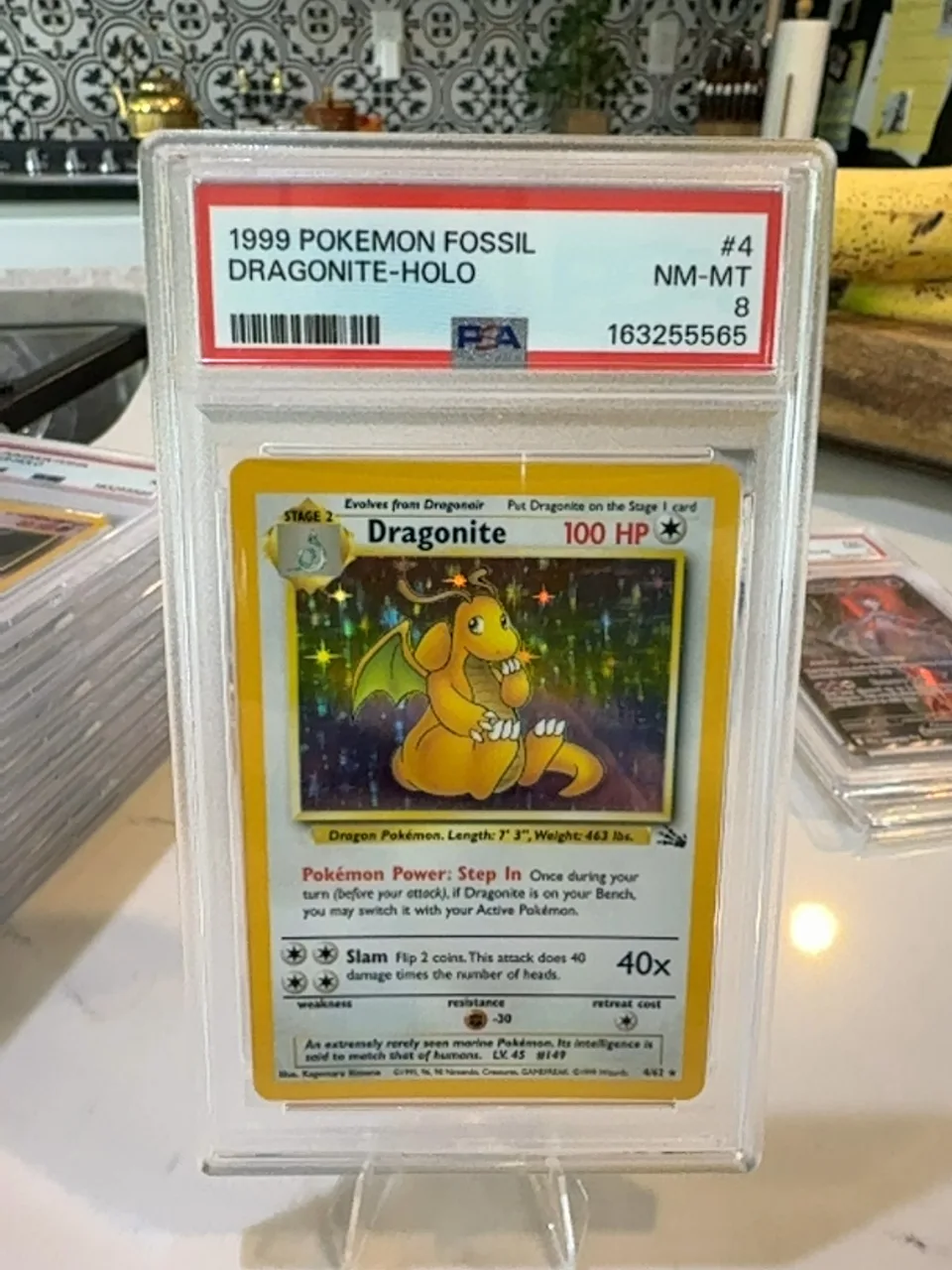 1999 Pokémon Fossil Dragonite-Holo #4 PSA 8